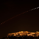 Illustration for article titled A lunar eclipse leaps over the Acropolis